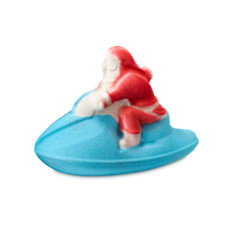 Jet Ski. A novelty bath bomb shaped like Santa Claus, dressed in red and white, riding a bright blue jet ski.