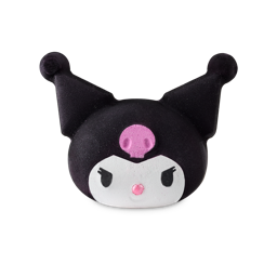 Kuromi. A Hello Kitty-themed bath bomb in the shape of an oval, white-faced character wearing a black hat with two ear points. There is a small, pink shimmering nose, black eyes with eyelashes and a pink icon in the centre of the black hat. 