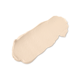 A close-up product swatch of a thick, elongated, textured streak of Light Cool Skinwear makeup. The color is a very pale, cool-toned beige/ivory.