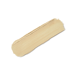 A close-up product swatch of a thick, elongated, textured streak of Light Neutral Beauty Balm. The color is a neutral pale yellow-beige