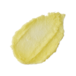 Lip Service. A neatly smeared swatch of thick, pale yellow coloured lip balm with a slightly glossy finish.