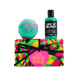 Little Lord of Misrule gift. A groovy, neon-wrapped box with black string sat under a Lord of Misrule shower gel and bath bomb.