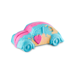 Love Bug. A bath bomb shaped like a classic Volkswagen Beetle car coloured in blue, pink and yellow. A small pink heart sits on the door.