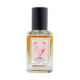 Lush | Bridgerton. The classic LUSH clear glass perfume bottle with a black lid. There is an amber liquid inside. The label includes intricate borders and a diamond icon with the Lush | Bridgerton text.