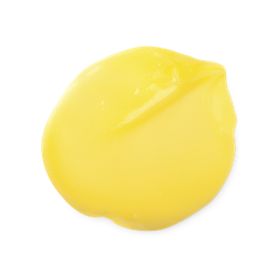 Marilyn. A smooth, round dollop of bright yellow hair treatment. The product has a glossy, fluid texture with subtle folds and a slight peak on one side where it was swirled.