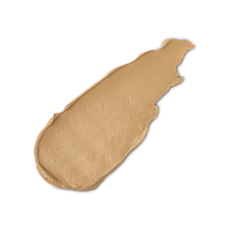 A close-up product swatch of a thick, elongated, textured streak of Medium Neutral Skinwear makeup. The colour is a light-to-medium golden beige.
