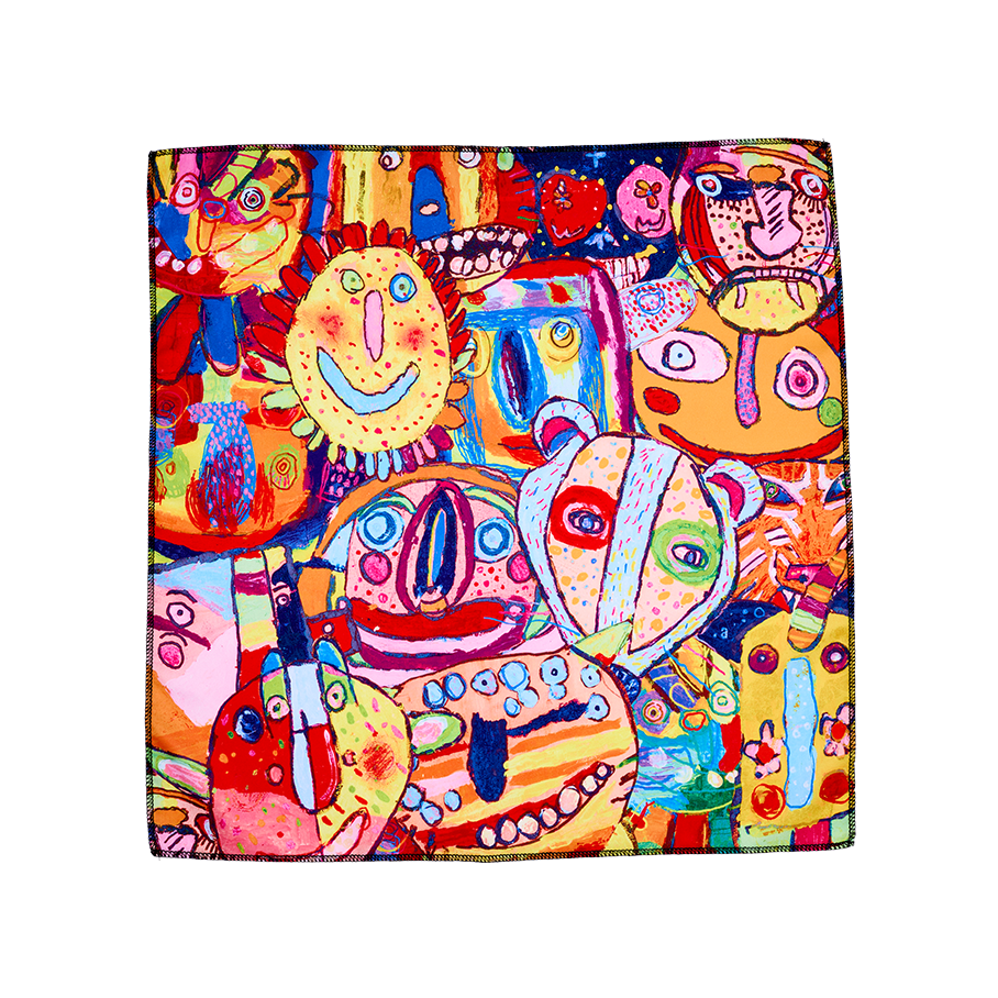 Mischief Makers. The image shows a square, multicoloured fabric wrap with a vibrant, collage-like design. It features a dense collection of abstract, cartoonish monster faces in bold shades of red, yellow, blue, and green.