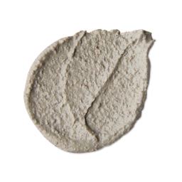Movis. A neatly smeared swatch of coarse, pebbled-textured face mask with small, darker flecks.