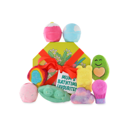 Mums Bathtime Favourites. A cardboard, octagonal gift box sits on its side. It is bright yellow with a flower design in the centre, wrapped with a thick red ribbon and a white gift tag. Nine bath products sit around it.