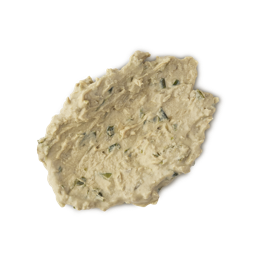 Nanakusa Gayu. A neatly smudged swatch of thick, textured, off-cream-coloured face mask with flecks of finely ground fresh ingredients and herbs.