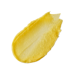 None of Your Beeswax. A neatly smeared swatch of thick, yellow honey-coloured lip balm with a slightly glossy finish.