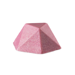 A faceted, pyramid-shaped bar of Pink Glitterbug Body bar in a dense, shimmering rosy pink color with visible plastic free glitter, set against a light grey background.