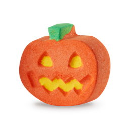 Punkin Pumpkin. a vibrant orange, pumpkin-shaped bath bomb with a green stem. Its front features carved yellow triangular eyes, a triangular nose, and a zig-zag mouth