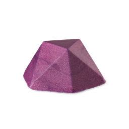 A small, solid bar of product, likely a body butter or shimmer bar, shaped like a low pyramid or faceted gem. It is a dense, shimmering deep purple/magenta color with visible plastic free glitter, set against a light grey background.