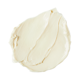 Retread. A smooth, thick dollop of cream-coloured hair conditioner. The product has a rich, glossy consistency with gentle swoops and ridges from being swirled, showing a soft, moisturising texture.