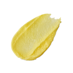 Rose Lollipop. A neatly smeared swatch of thick, rich yellow coloured lip balm with a slightly glossy finish.