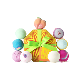 Groovy Kind of Lush. A psychedelic yellow and orange, octagonal hat box gift, tied with a green ribbon and a gift tag.