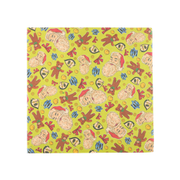 Santa's On His Way! A square sheet of Lokta wrapping paper. It features a yellow background with illustrations of bows, Santa faces, bells, rocking horse heads, and robot faces. 