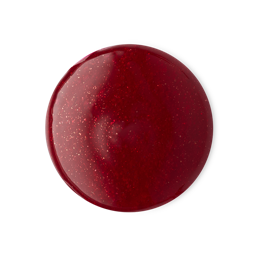Scan Me For Scares. A perfectly circular swatch of deep, blood-red shower gel with golden shimmer throughout. 