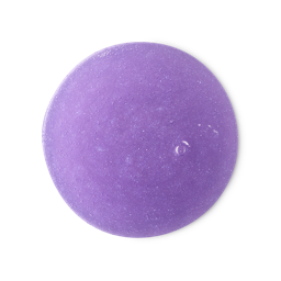 Sex Bomb. A perfectly circular swatch of a glossy, thick, lavender-coloured shower gel with sparkling lustre throughout.
