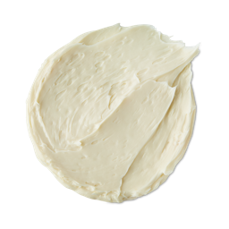 Skin Guardian. A round-ish, neatly smudged swatch of creamy, matte-ivory facial sunscreen. 