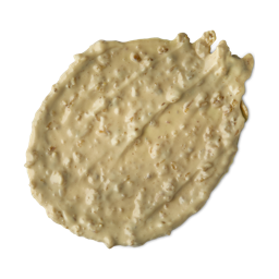 Skin Soothing Porridge. A thick swatch of creamy, pale yellow face mask with small pieces of exfoliating oats just visible. 