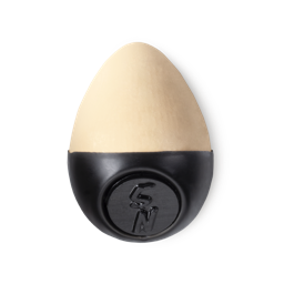 Slap Stick 5N. A light-neutral, light beige coloured, egg-shaped solid foundation, with a black wax base.