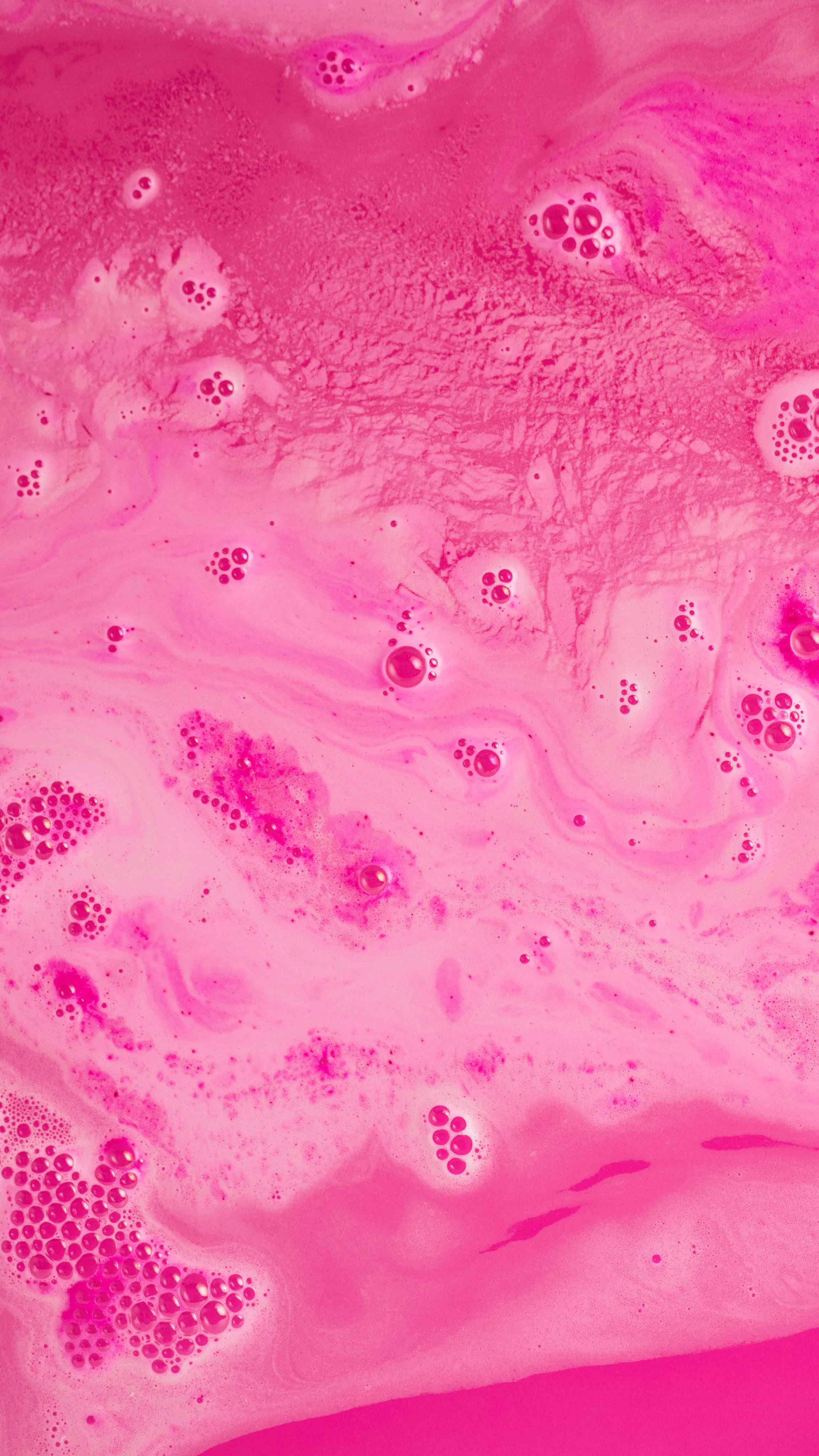 Snow Fairy bath bomb has completely dissolved leaving behind and ocean of deep pink swirls and frothed peaks. 