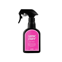 Snow Fairy. A black bottle of Lush Snow Fairy body spray with a black trigger nozzle and a bright pink label with white text and border, displayed centrally.
