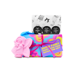 A Lush 'Snow Fairy Paint Your Own Bath Bomb Gift' set featuring a pink fairy bath bomb, three small paint pots, a doe-foot applicator brush, and a brightly wrapped pink and blue gift box
