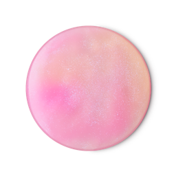 Snow Fairy Tw-Tone. A perfectly circular swatch of the Snow Fairy two-tone shower gel. It is a gently mixed pink and peach colour with pink, shimmering glitter throughout.