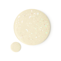 Snowing. Two perfectly circular droplet swatches of the Snowing bath oil. It is a clear oil with shimmering, iridescent flecks throughout. 