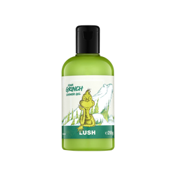 A clear plastic bottle filled with bright lime green Lush Sour Grinch shower gel, featuring a black flip-top cap and an illustration of the Grinch on the label