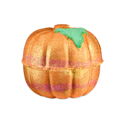 Sparkly Pumpkin. A pumpkin-shaped bath bomb with a shimmering golden-orange surface with textured segments and a small green leaf on top.