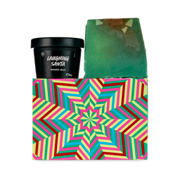 Star Bright. A short, rectangular gift box with a colourful, isometric star design on the front. Two products are sitting on top of the box. One product is a green slice of soap and the other is a black-potted shower jelly. 