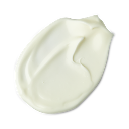 Sun Companion. A neatly smudged swatch of thick, creamy, ivory sunscreen lotion. 