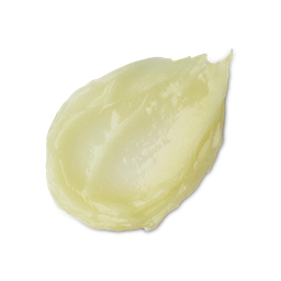 A thick, glossy swatch of pale yellow Super Milk lip gloss. The translucent texture is smooth and highly reflective.