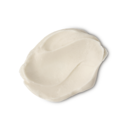 A studio shot of a textured swatch of LUSH Supermilk hair conditioner, a pale, off-white product, against a light gray background.