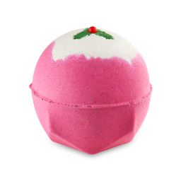 Sweet Pudding. A spherical bath bomb with a geometric base. It is vibrant pink and topped with white, showing a tiny holly leaf and berry detail on top. 