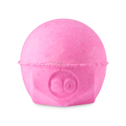 Sweet Ruby. A spherical bath bomb with a flat, geometric base. The product is a vibrant pink colour with the number "30" embossed on the side. 