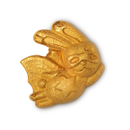 The Easter Bunny bubble bar, a superhero rabbit, flying with a cape and eye mask, that's covered in gold. 