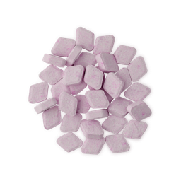 The Kiss. A small pile of about three dozen, pastel pink, chalky, rounded-diamond-shaped mouthwash tablets. 
