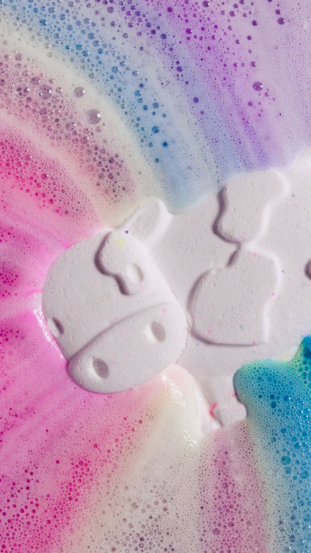 Rainbow bubbles and a little glimpse of a magic cow's face.