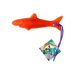 Tope-On-A-Rope. A vivid burnt orange-coloured shark-shaped soap. There is a hole at the tail-end of the soap with a purple rope tied with two knots and a fun, illustrated label which reads: "Tope-On-A-Rope Soap".