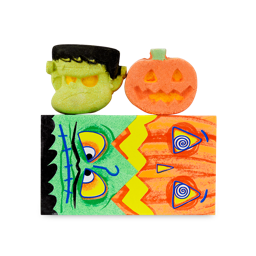 Trick Or Treat. A colourful gift box. Each half of the box looks like a themed character. One half is a green Frankinstein's Monster face and the other half is an orange pumpkin face. Two bath bombs of the same characters are sat on top of the box. 