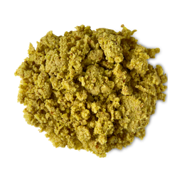 Turmeric Roll. A round mound of golden, textured, exfoliating cleanser with visible ground almonds.