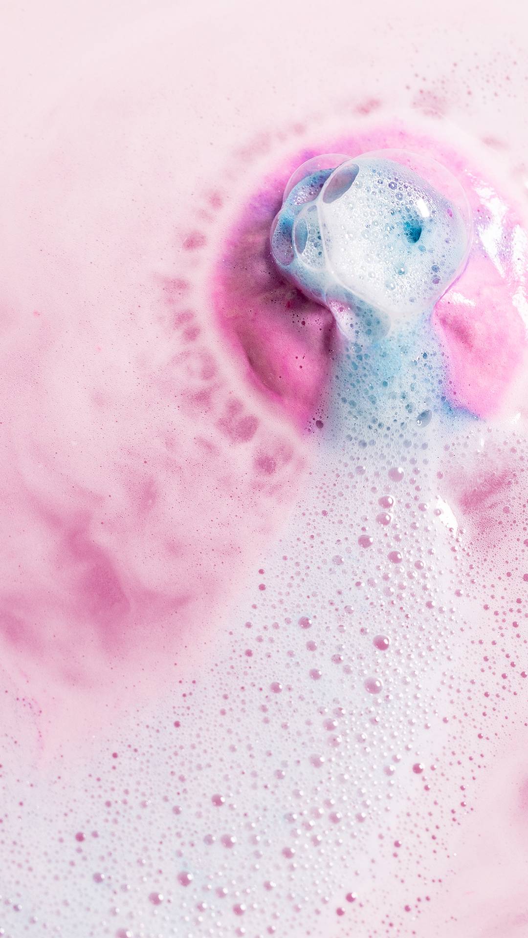 Twilight bomb frothing up in the bath, pink and blue bubbles.