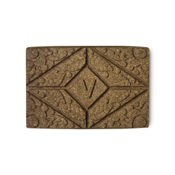 Vénitien Henna. A brown rectangular block of solid henna hair colour, with a floral design and the letter V pressed on the top.