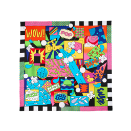 Lush Pop Art. A square, fabric knot wrap with a colourful pop art design in black, blue, pink, red, and yellow, with text reading "WOW!", "POP!", "BAM!", "FIZZ!", and "SPLOSH!". A stylised gold faucet is at the centre of the design.